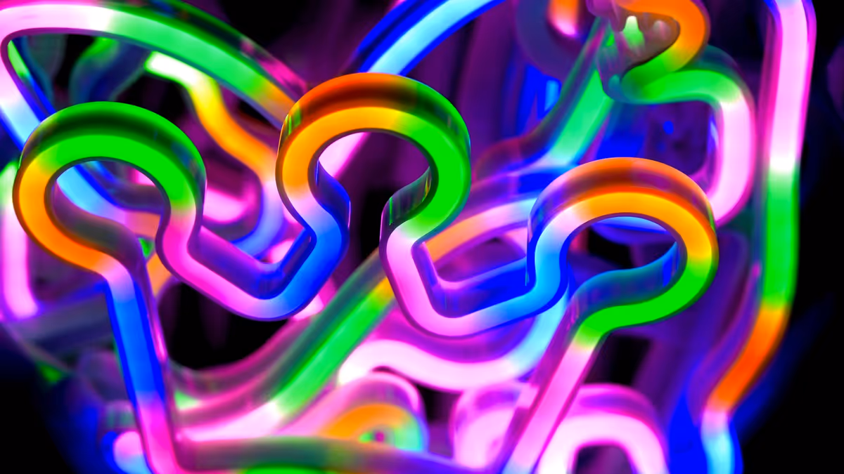 Tubos de neón de colores brillando en la oscuridad