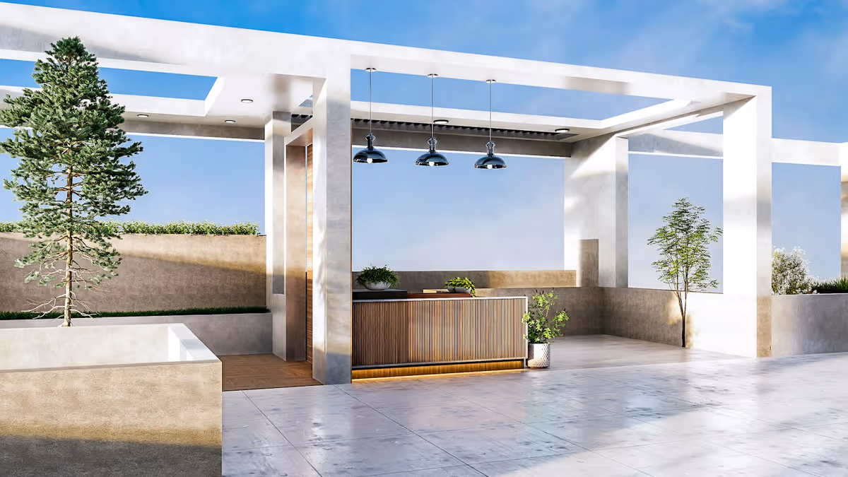 Salón al aire libre con bar y plantas iluminado para evento nocturno